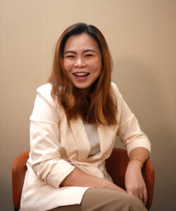 Evonne, Benel team member, smiling professional portrait