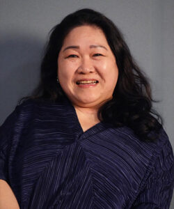 Shelia, Benel team member, smiling professional portrait