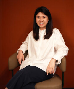 YX, Benel team member, smiling professional portrait
