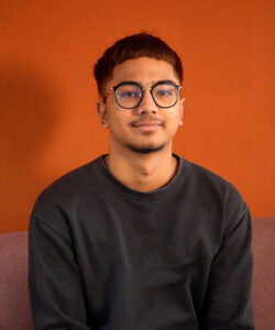 Benel team member, smiling professional portrait