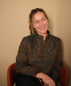 Bea, Benel team member, smiling professional portrait