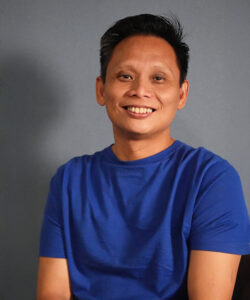 Ken, Benel team member, smiling professional portrait