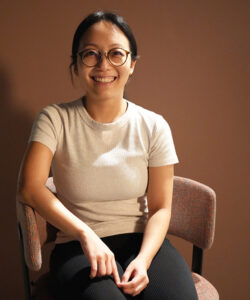 Nat, Benel team member, smiling professional portrait
