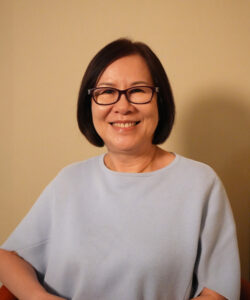 Stephanie, Benel team member, smiling professional portrait